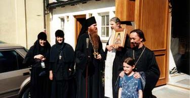 Bishop Agapit (left) Archpirest Nikolai Artemoff (right) with icon