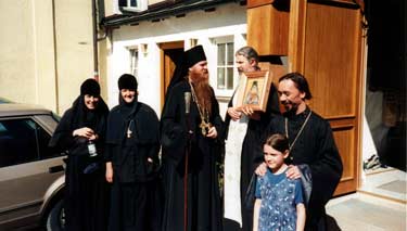 Bishop Agapit (left) Archpirest Nikolai Artemoff (right) with icon