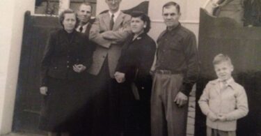 Dm. Nikolaevich, second from left, at the temple in Lima.