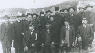 Visiting parishes in Alaska. Bp. Antony is tall in kamilavka on the right. Photo: Alaska State Library