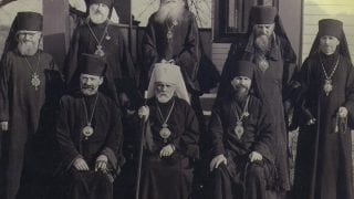 Hierarchs of North American Metropolitan. Left to right sitting: Archb Adam, Met. Theophil, Archb. Vitlay; Standing: Bps. Makary, Leonty, Tikhon, Arseny, unidentified bishop. The late 1930s