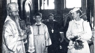 At the millennium celebrations Bishop Mark presents Queen Margaret with a memorial medal