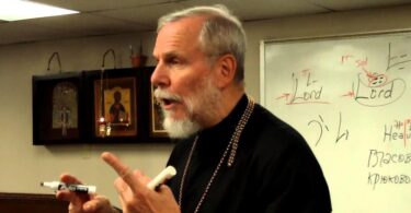 Father Pimen teaches music literacy at parish school