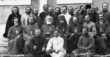 In Gallipoli the clergy of the 1st Army Corps including Dean of corp  Fr. Fedor Milianovskii (sitting in the second row, third from left), Dean of the 1st Infantry Division, Fr. Nikolai Butkov (sitting next to the left), priest of the Kornilov shock regiment Leonid Rozanov (sitting fifth on the left). c.1921.